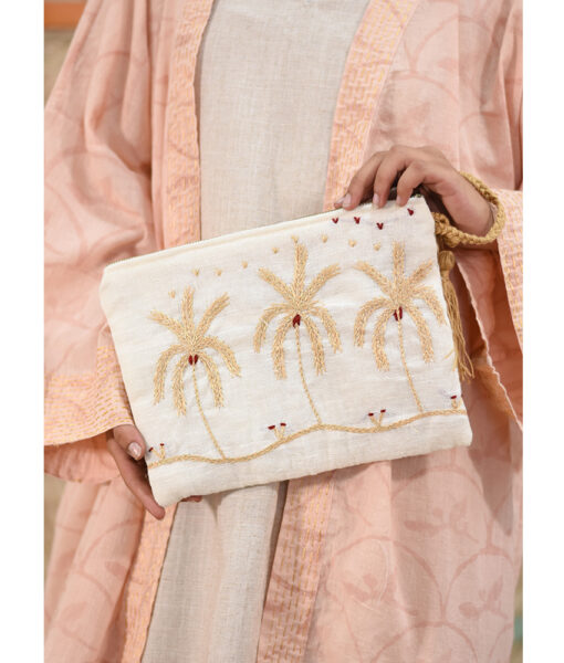 Off White Embroidered Clutch handmade in Egypt & available at Jozee Boutique.