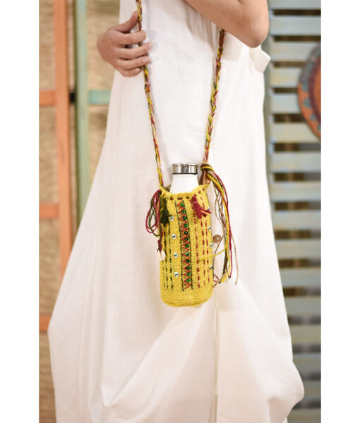 Yellow Embroidered Burlap Bottle Cover handmade in Egypt & available at Jozee Boutique.