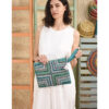 Turquoise Embroidered Clutch handmade in Egypt & available at Jozee Boutique.