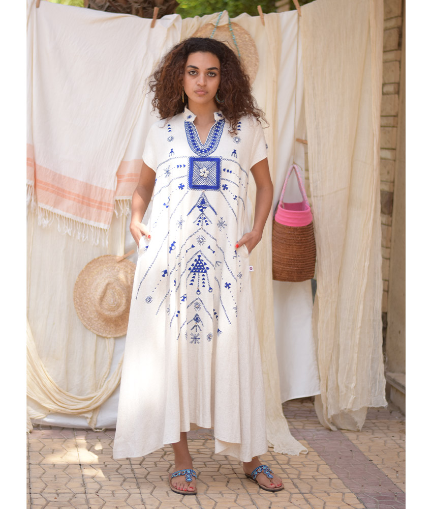 Off White Siwa Embroidered Linen Japanese Dress handmade in Egypt & available at Jozee Boutique.