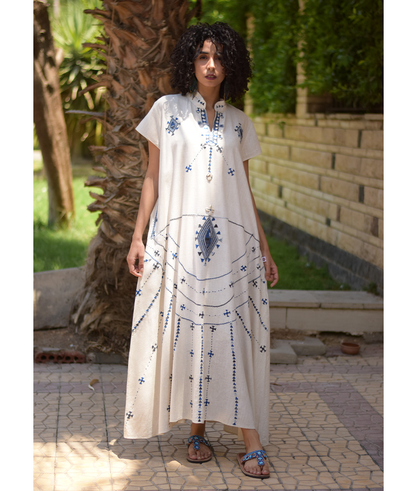 Off White Siwa Embroidered Linen Japanese Dress handmade in Egypt & available at Jozee Boutique.