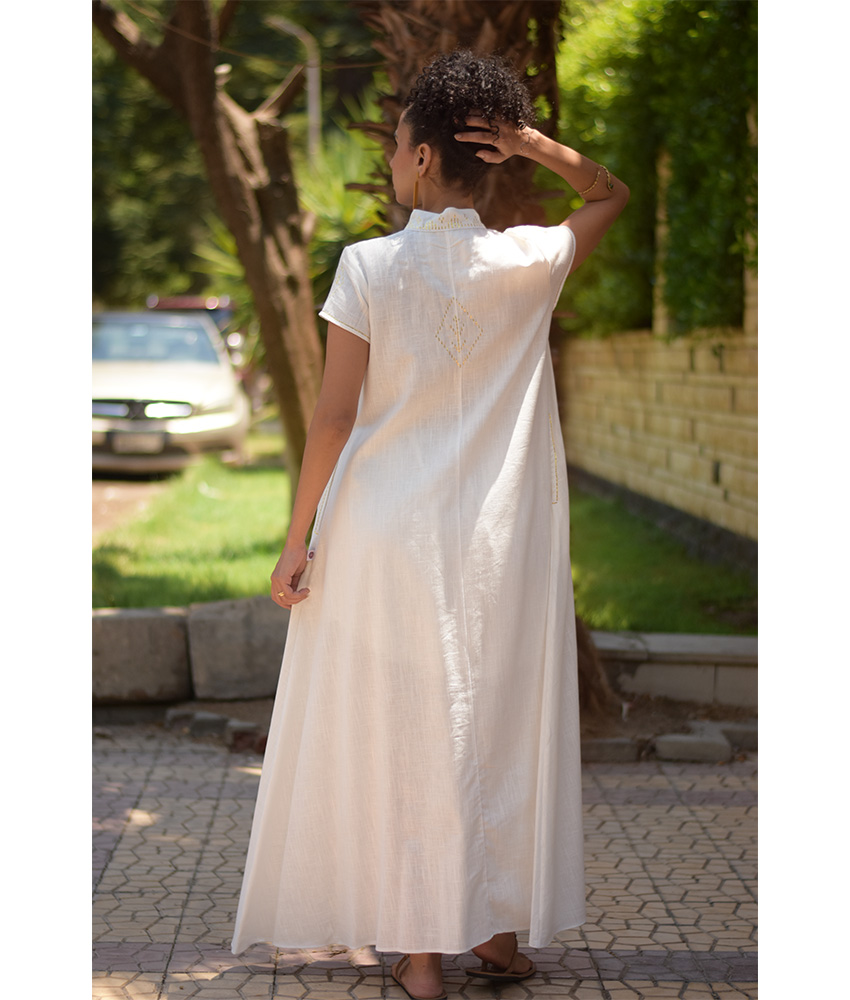 Off White Linen Dress with gold Tally Embroideries handmade in Egypt & available at Jozee Boutique.