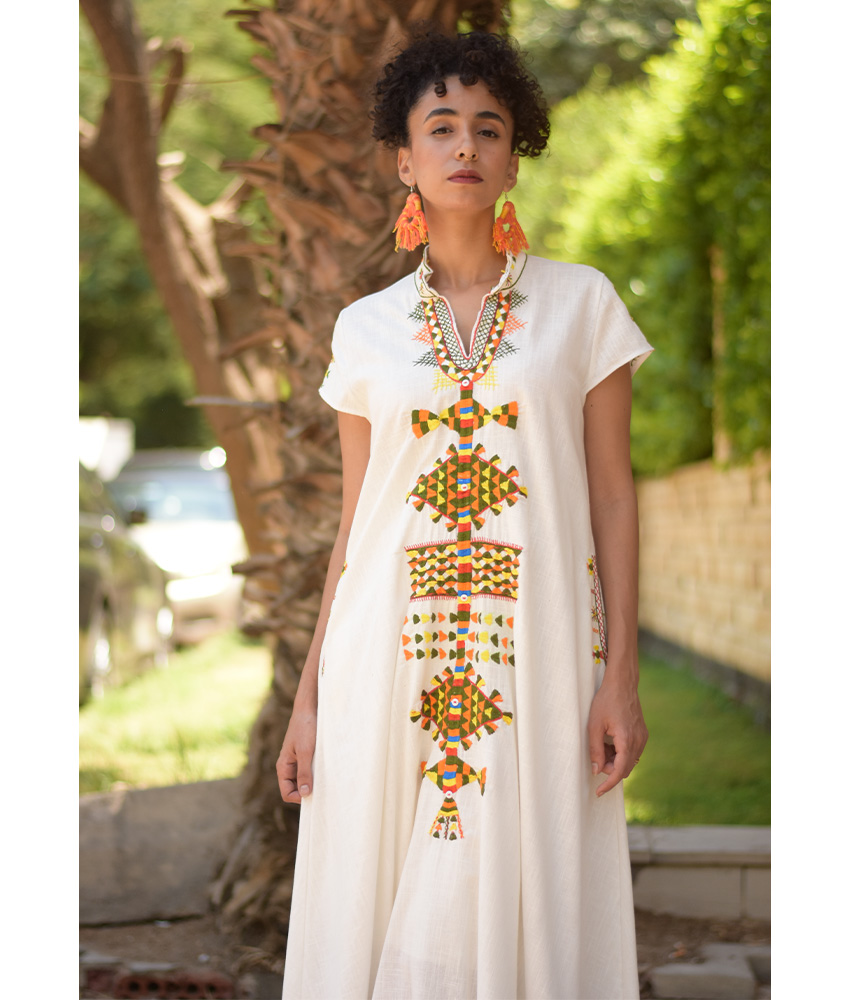 White Siwa Embroidered Linen Japanese Dress handmade in Egypt & available at Jozee Boutique.