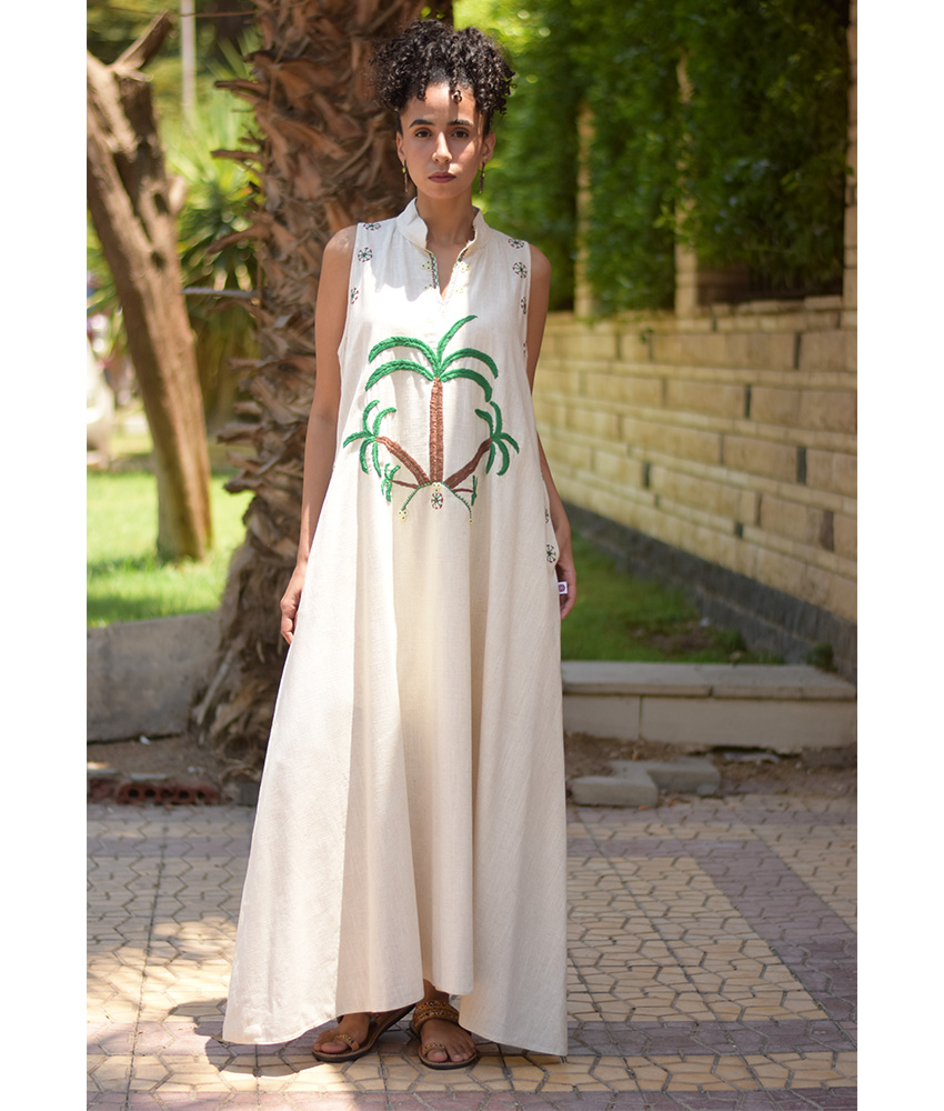 Off White Siwa Embroidered Linen Japanese Dress handmade in Egypt & available at Jozee Boutique.
