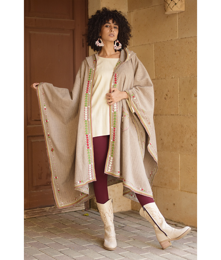 Beige Siwa Embroidered Wool Midi Cape handmade in Egypt & available at Jozee Boutique.