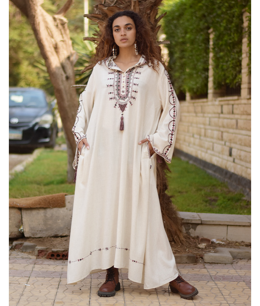 Off white Siwa Embroidered Linen Dress with Hoodie handmade in Egypt & available at Jozee Boutique.