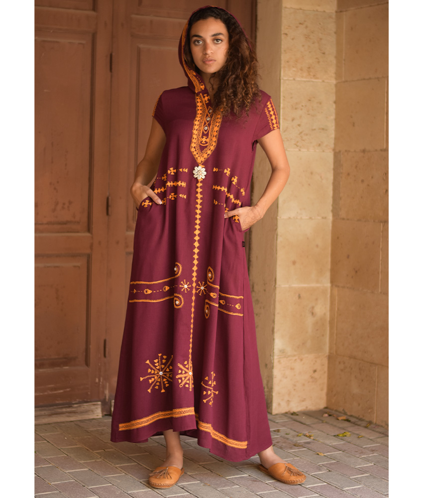 Burgundy Siwa Heavily Embroidered Linen Dress with Hoodie handmade in Egypt & available at Jozee Boutique.