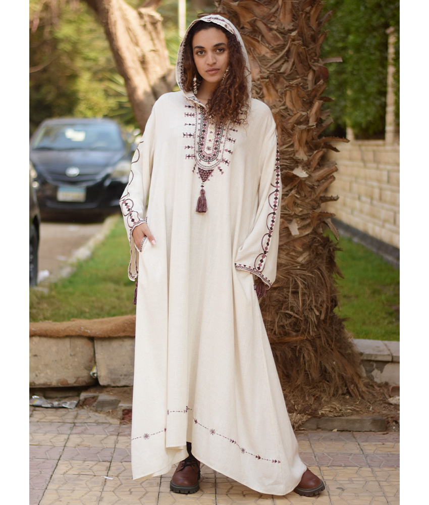 Off white Siwa Embroidered Linen Dress with Hoodie handmade in Egypt & available at Jozee Boutique.