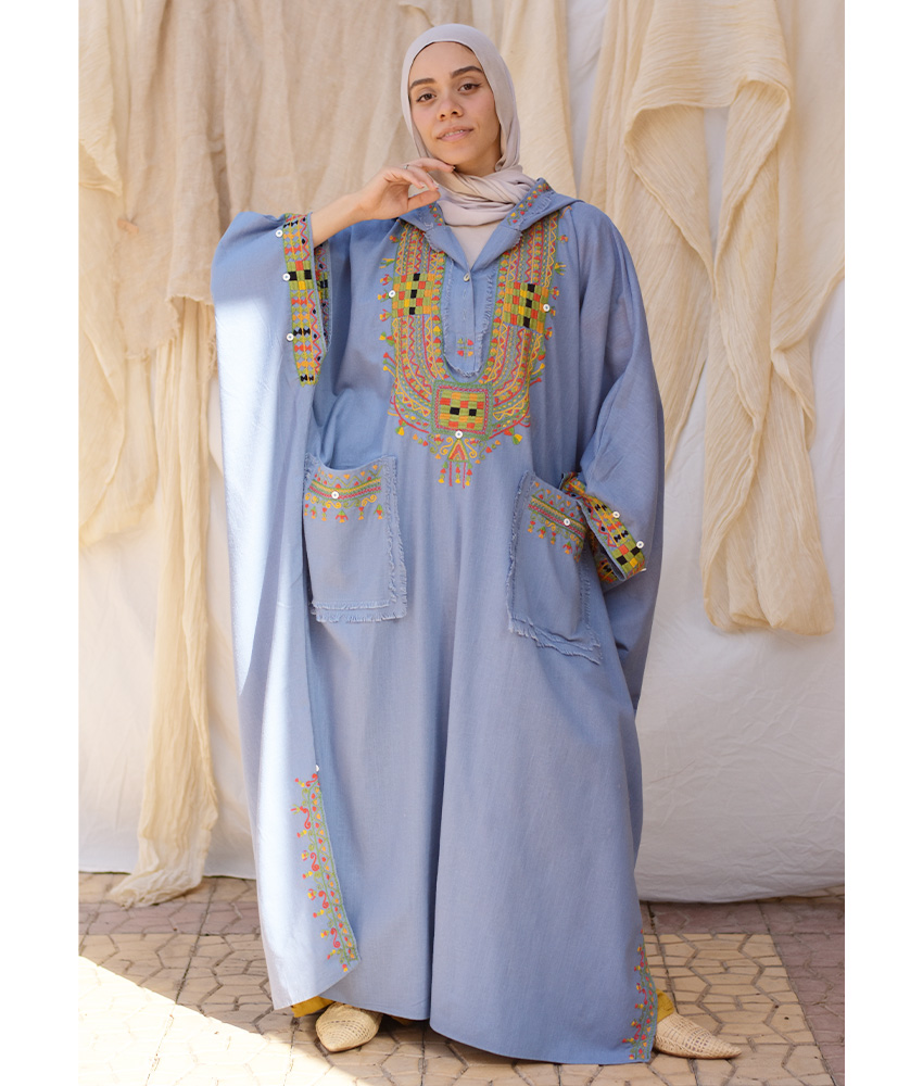 Denim blue Siwa Embroidered Linen Kaftan with Hoodie handmade in Egypt & available at Jozee Boutique.
