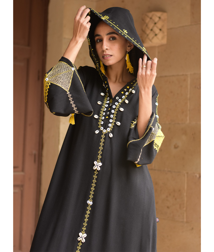 Black Siwa Embroidered Linen Dress with Hoodie handmade in Egypt & available at Jozee Boutique.