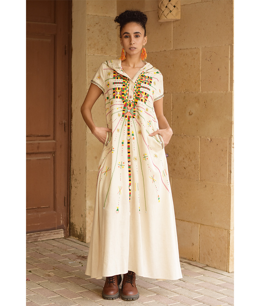 Off white Siwa Heavily Embroidered Linen Dress with Hoodie handmade in Egypt & available at Jozee Boutique.