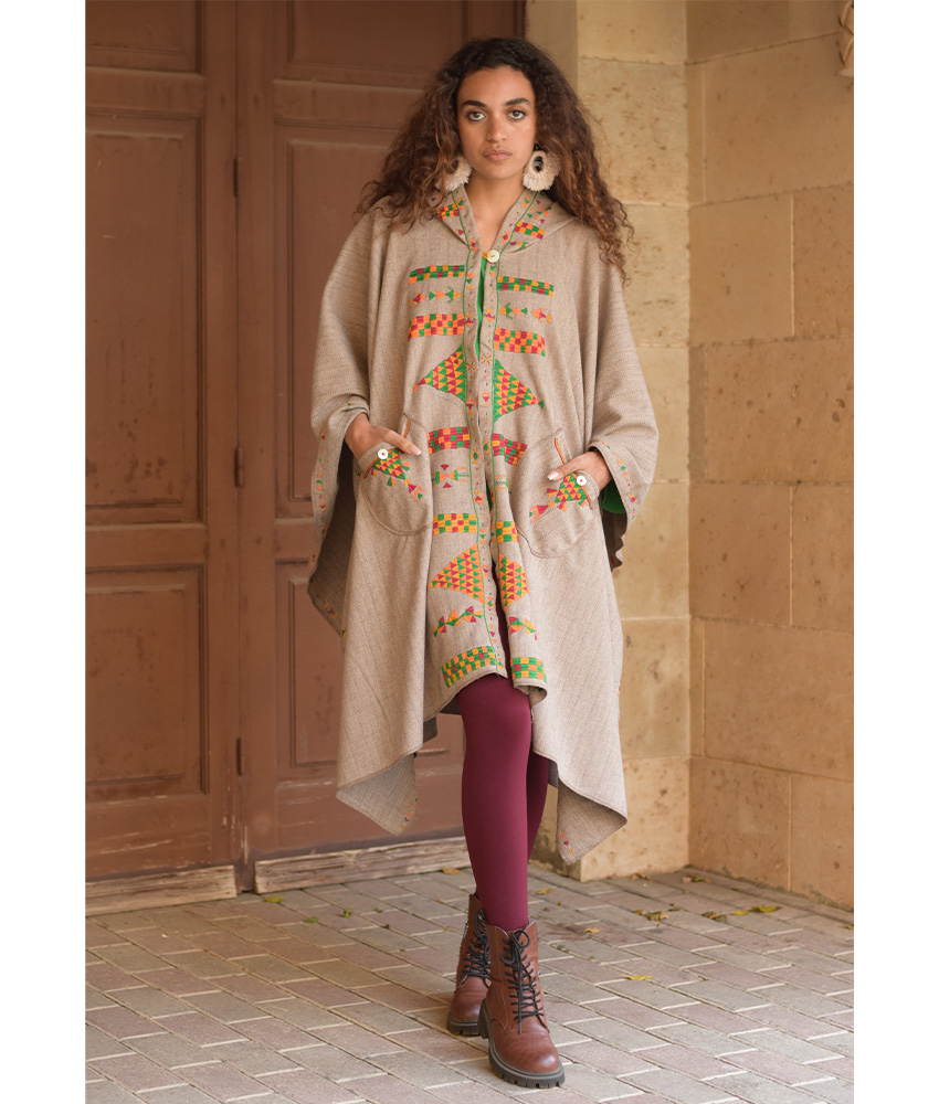 Beige Siwa Embroidered Wool Midi Cape handmade in Egypt & available at Jozee Boutique.
