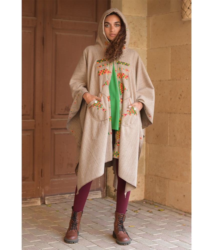 Beige Siwa Embroidered Wool Midi Cape handmade in Egypt & available at Jozee Boutique.