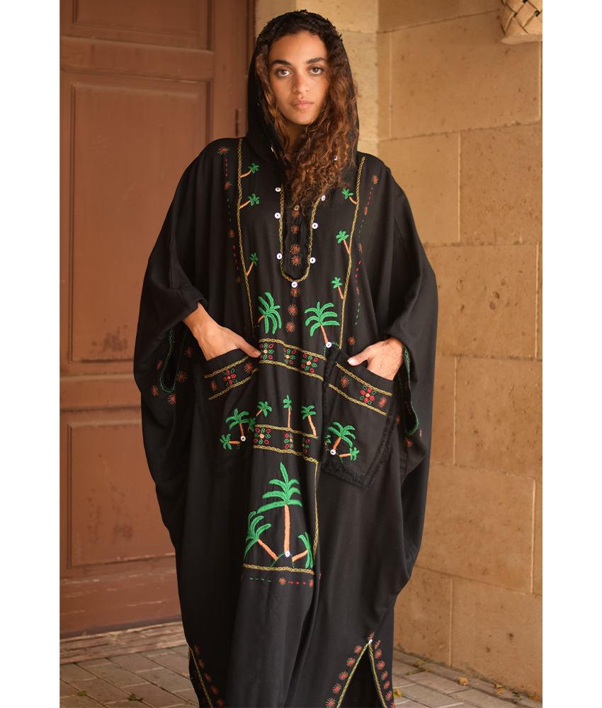 Black Siwa Heavily Embroidered Linen Kaftan with Hoodie handmade in Egypt & available at Jozee Boutique.
