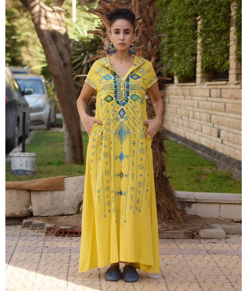 Mustard Siwa Heavily Embroidered Linen Dress with Hoodie handmade in Egypt & available at Jozee Boutique.