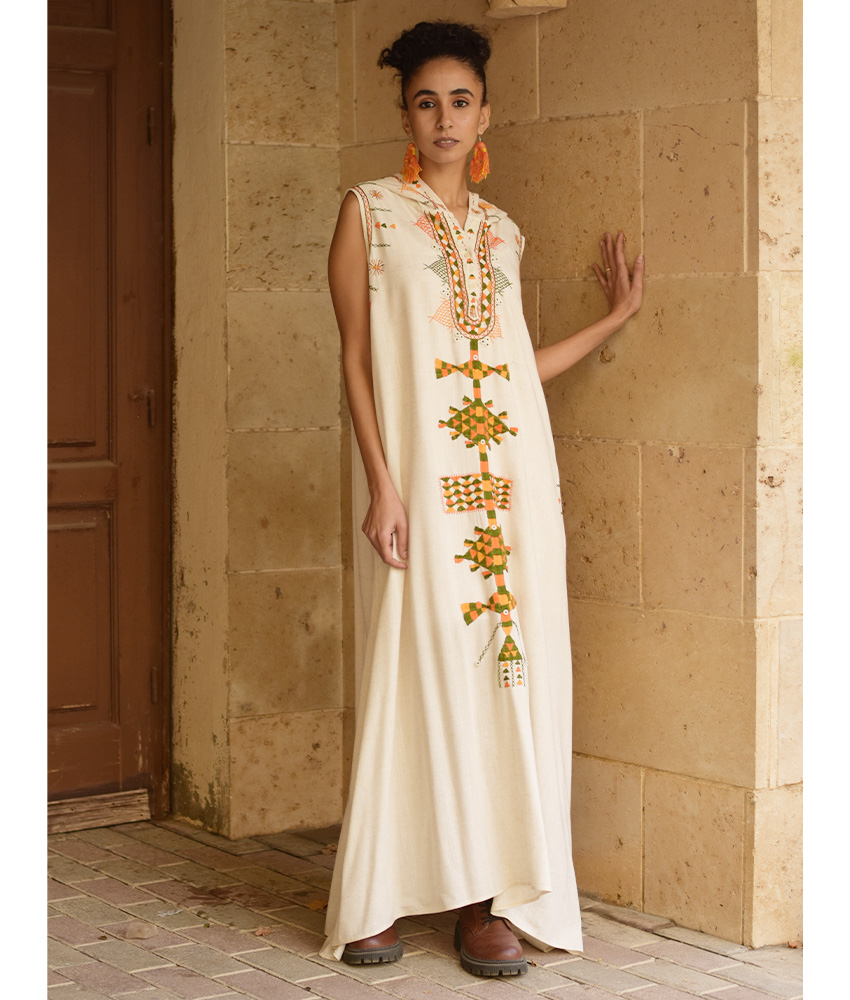 Off white Siwa Heavily Embroidered Linen Dress with Hoodie handmade in Egypt & available at Jozee Boutique.