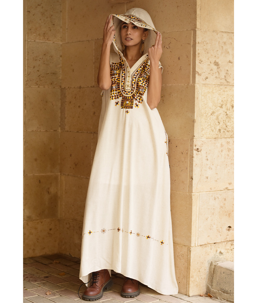 Off white Siwa Embroidered Linen Dress with Hoodie handmade in Egypt & available at Jozee Boutique.