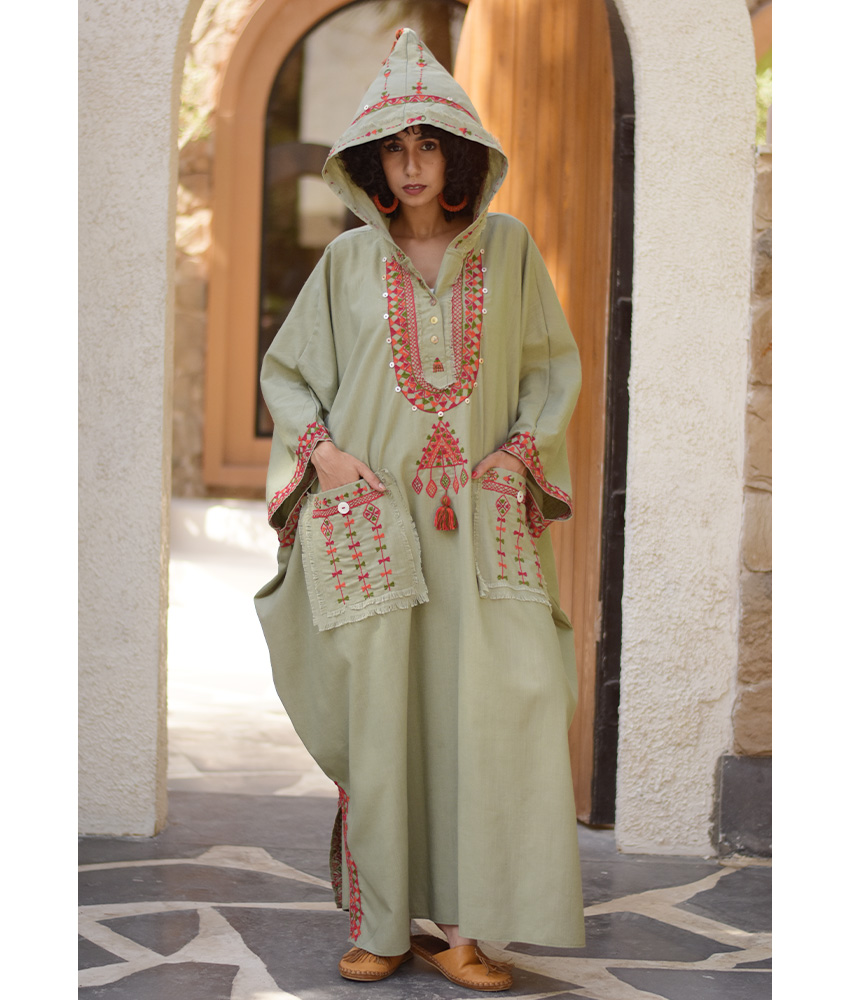 Light olive Siwa Embroidered Linen Kaftan with Hoodie handmade in Egypt & available at Jozee Boutique.