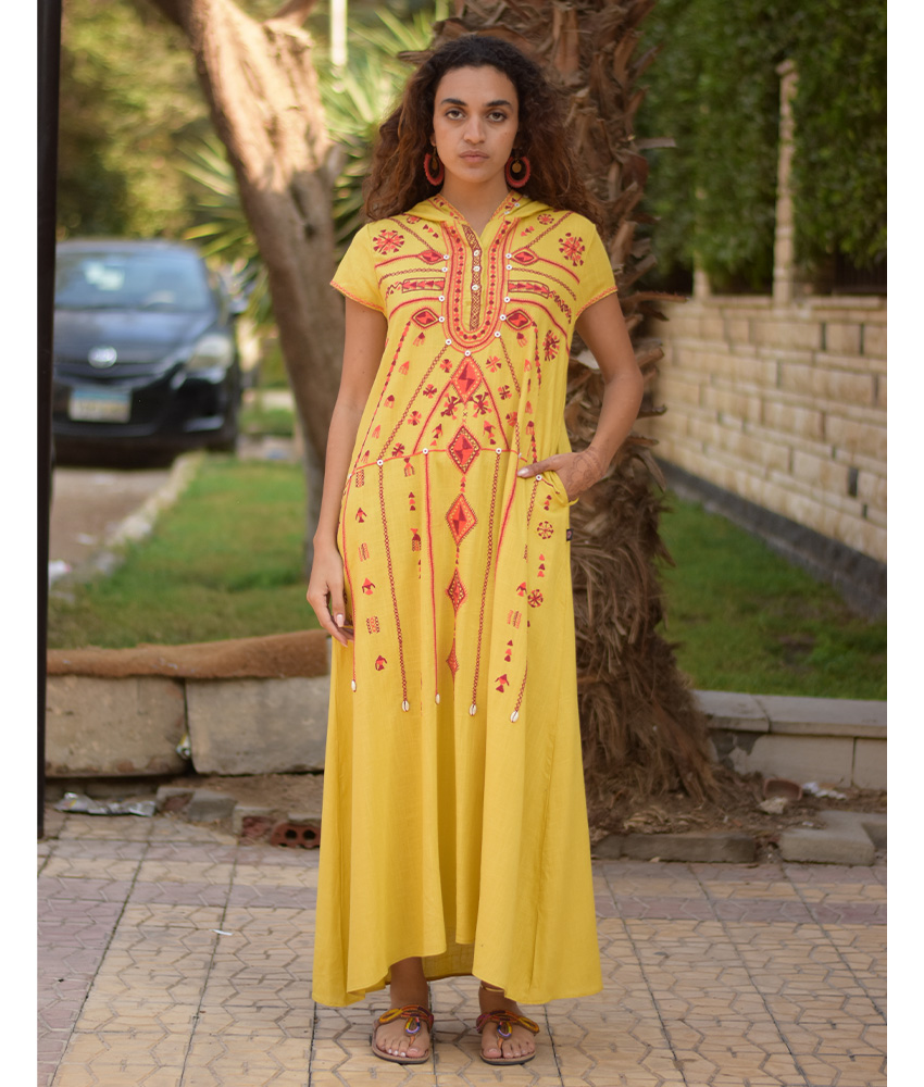 Mustard Siwa Heavily Embroidered Linen Dress with Hoodie handmade in Egypt & available at Jozee Boutique.