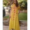 Mustard Siwa Heavily Embroidered Linen Dress with Hoodie handmade in Egypt & available at Jozee Boutique.