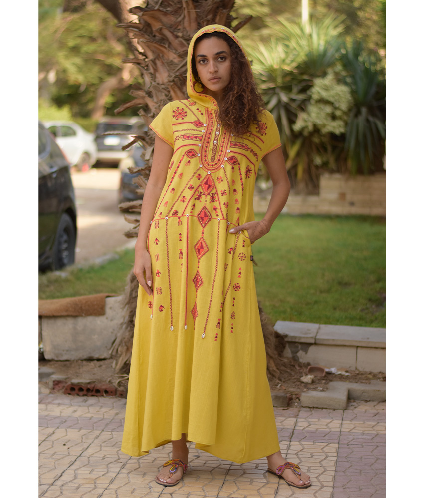Mustard Siwa Heavily Embroidered Linen Dress with Hoodie handmade in Egypt & available at Jozee Boutique.