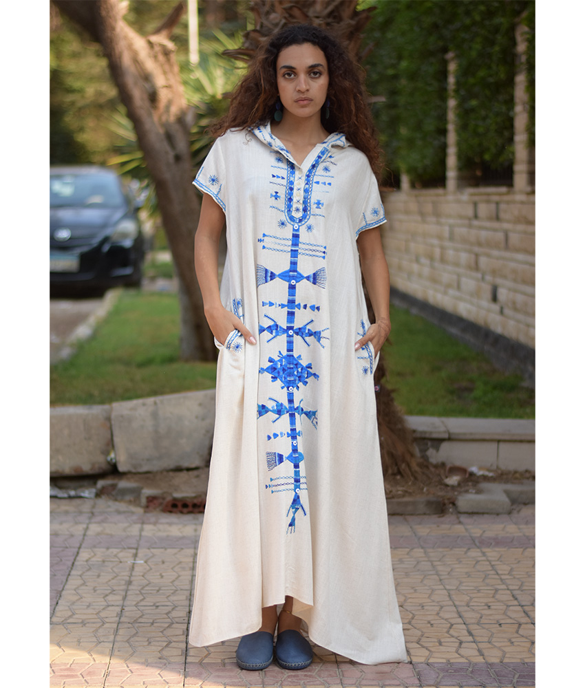White Siwa Heavily Embroidered Linen Dress with Hoodie handmade in Egypt & available at Jozee Boutique.