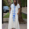 White Siwa Heavily Embroidered Linen Dress with Hoodie handmade in Egypt & available at Jozee Boutique.
