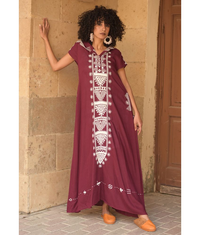 Burgundy Siwa Heavily Embroidered Linen Dress with Hoodie handmade in Egypt & available at Jozee Boutique.
