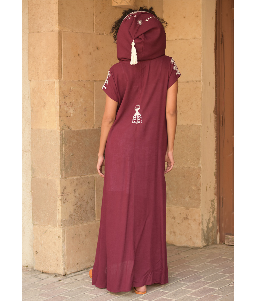 Burgundy Siwa Heavily Embroidered Linen Dress with Hoodie handmade in Egypt & available at Jozee Boutique.