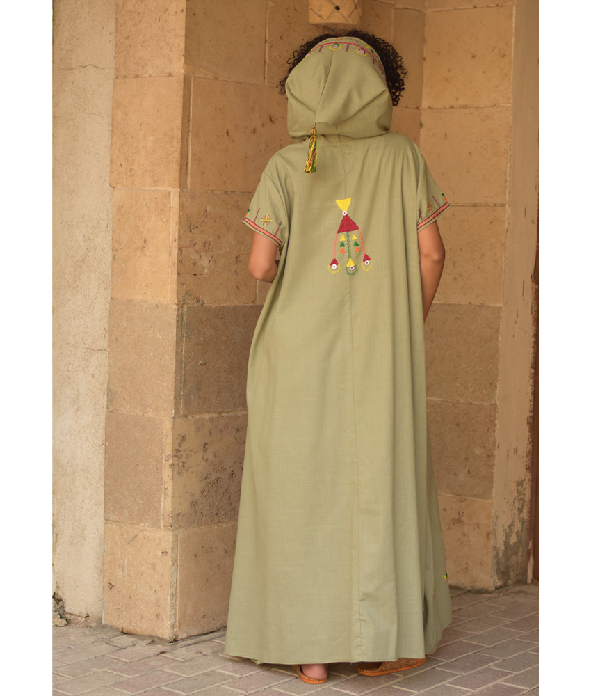 Light olive Siwa Heavily Embroidered Linen Dress with Hoodie handmade in Egypt & available at Jozee Boutique.