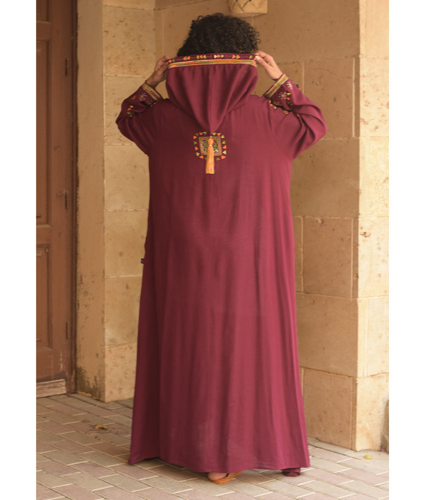 Burgundy Siwa Embroidered Linen Dress with Hoodie handmade in Egypt & available at Jozee Boutique.