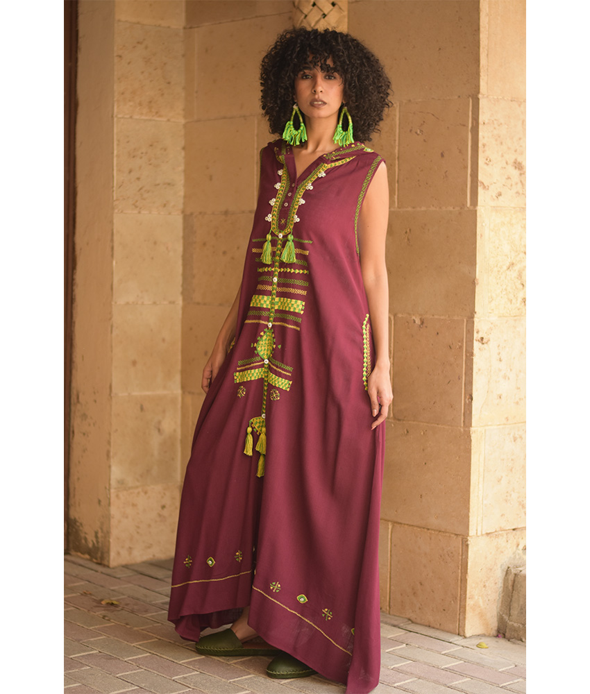 Burgundy Siwa Heavily Embroidered Linen Dress with Hoodie handmade in Egypt & available at Jozee Boutique.