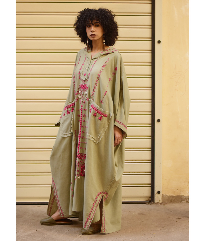 Light olive Siwa Embroidered Linen Kaftan with Hoodie handmade in Egypt & available at Jozee Boutique.