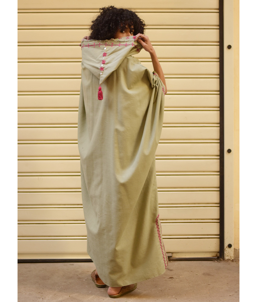 Light olive Siwa Embroidered Linen Kaftan with Hoodie handmade in Egypt & available at Jozee Boutique.