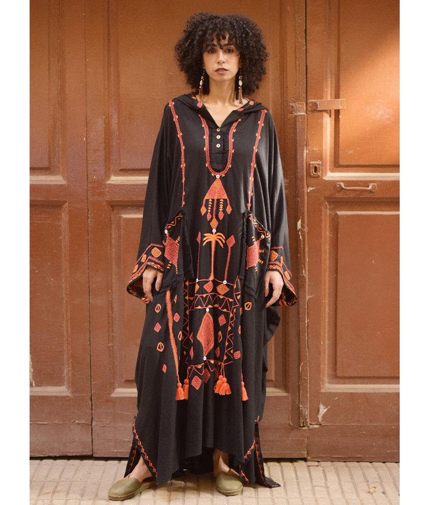 Black Saiwa Embroidered Linen Kaftan with Hoodie handmade in Egypt & available at Jozee Boutique.