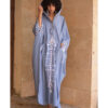 Denim blue Siwa Heavily Embroidered Linen Kaftan with Hoodie handmade in Egypt & available at Jozee Boutique.
