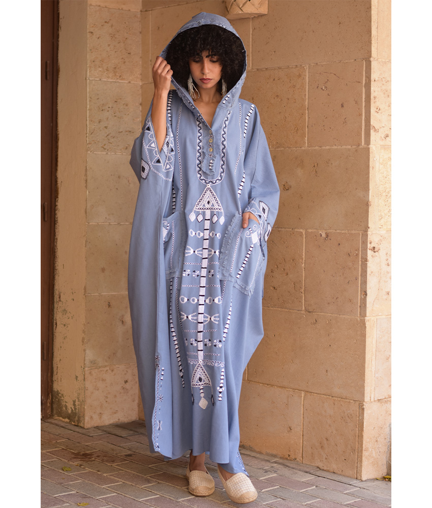Denim blue Siwa Heavily Embroidered Linen Kaftan with Hoodie handmade in Egypt & available at Jozee Boutique.