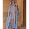 Denim blue Siwa Heavily Embroidered Linen Kaftan with Hoodie handmade in Egypt & available at Jozee Boutique.