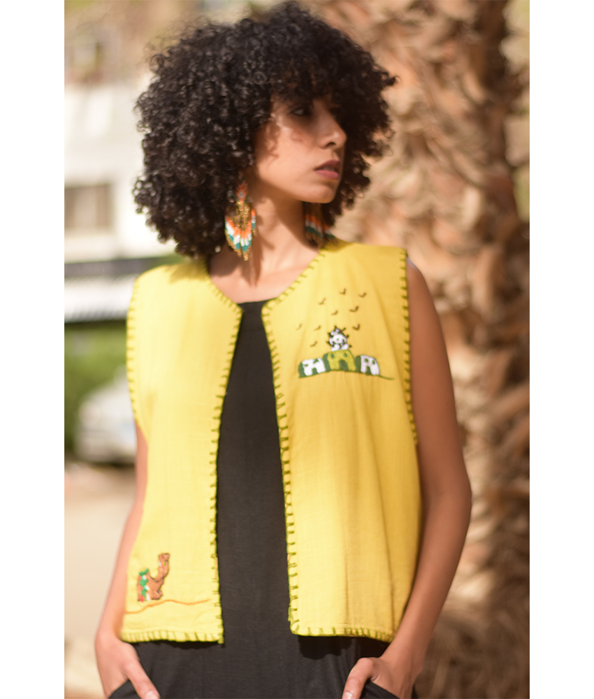 Yellow Hand Embroideries Linen Vest handmade in Egypt & available at Jozee Boutique.