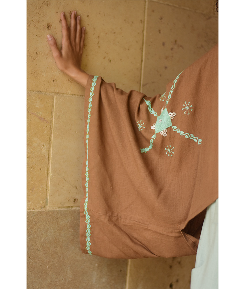 Cinnamon Brown Siwa Embroidered Linen Bolero made in Egypt & available at Jozee Boutique.