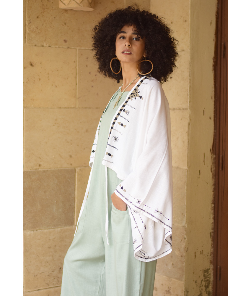 White Siwa Embroidered Linen Bolero made in Egypt & available at Jozee Boutique.