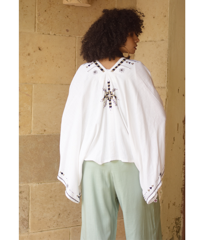 White Siwa Embroidered Linen Bolero made in Egypt & available at Jozee Boutique.