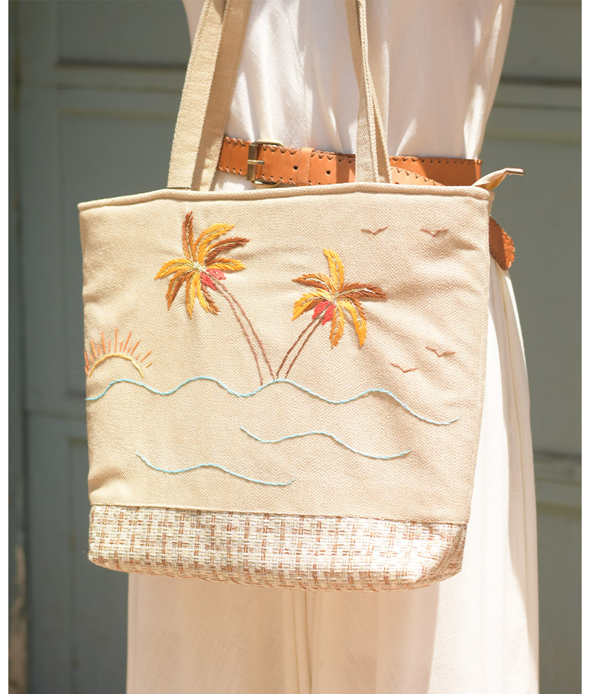 Off white Embroidered Palm Linen Tote Bag handmade in Egypt & available at Jozee Boutique.handmade in Egypt & available at Jozee Boutique.