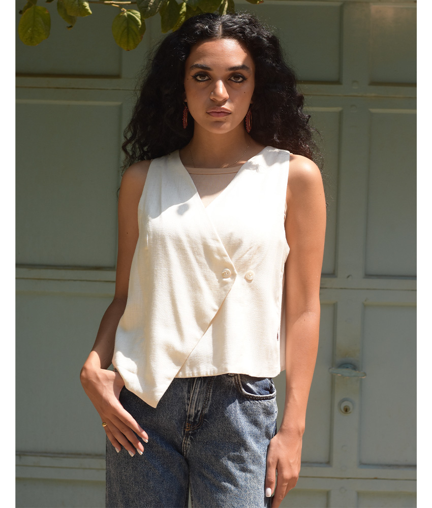 Off-White El Mahrousa Linen Wrap Vest handmade in Egypt & available at Jozee Boutique.