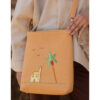 Camel Embroidered Palm Linen Cross Bag handmade in Egypt & available at Jozee Boutique.handmade in Egypt & available at Jozee Boutique.