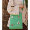 Mint green Embroidered Palm Linen Cross Bag handmade in Egypt & available at Jozee Boutique.handmade in Egypt & available at Jozee Boutique.