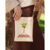 Off white Embroidered Palm Linen Cross Bag handmade in Egypt & available at Jozee Boutique.handmade in Egypt & available at Jozee Boutique.